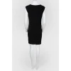 Fitted dress with a zipper on the shoulders