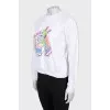 White sweatshirt with bright embroidery