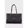 Black tote with branded embossing
