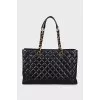 Black tote with branded embossing