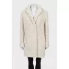 Loose-fitting fur coat with buttons