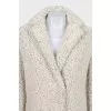 Loose-fitting fur coat with buttons