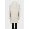 Loose-fitting fur coat with buttons