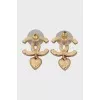 Gold-color earrings with heart-shaped pendant