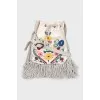 Denim shopper decorated with embroidery