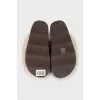 Fur slippers with leather insert