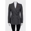 Gray jacket with branded patch