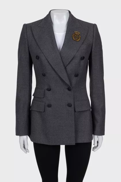 Gray jacket with branded patch