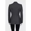 Gray jacket with branded patch