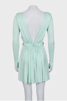 Fitted dress with a gold belt