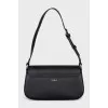 Black shoulder bag with tag