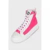 High-top sneakers with pink accents