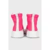 High-top sneakers with pink accents