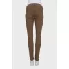 Slim-fit jeans with zippered pockets