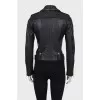 Leather jacket with a fitted cut and a belt