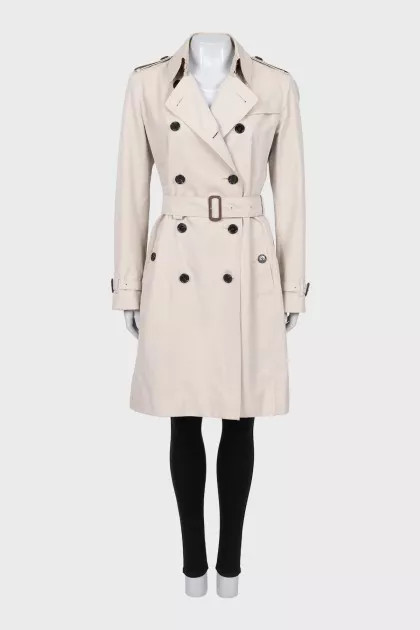 Double-breasted trench coat with buckles