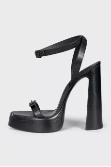 Leather sandals with high soles and heels