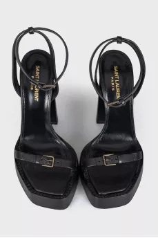Leather sandals with high soles and heels
