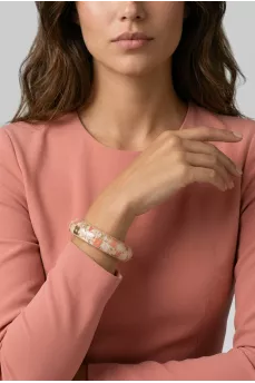 Rigid bracelet decorated with rhinestones and logo