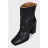 Leather ankle boots with raw uppers
