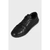 Black leather lace-up sneakers