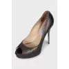 Brown leather shoes with gold heels