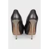 Brown leather shoes with gold heels