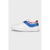 Leather sneakers with combined inserts