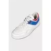 Leather sneakers with combined inserts