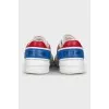 Leather sneakers with combined inserts