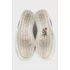 Leather sneakers with combined inserts
