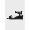Leather sandals with a medium wedge heel