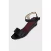 Leather sandals with a medium wedge heel