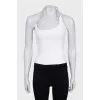 White top with metallic decor