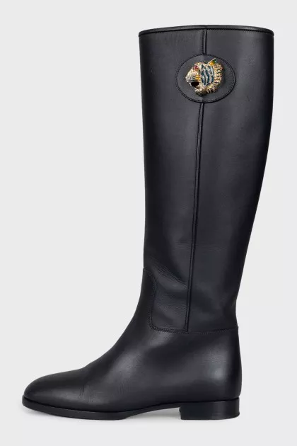 Black leather boots with metallic decor