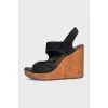 Suede sandals with a cork wedge heel
