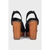 Suede sandals with a cork wedge heel