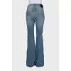 Light blue flared jeans with pockets