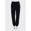 Sports pants with a white logo