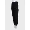 Sports pants with a white logo