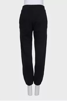 Sports pants with a white logo