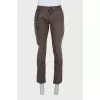 Men's jeans with zippers at the bottom with tag