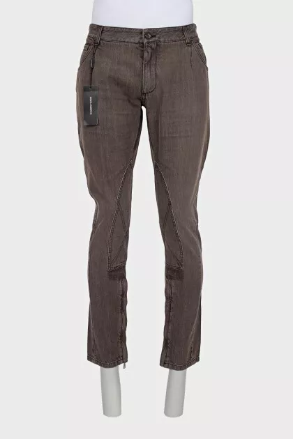 Men's jeans with zippers at the bottom with tag