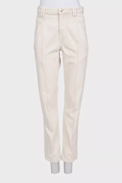 Beige jeans with creases