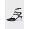 Rockstud black leather slingbacks