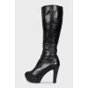 High-heeled leather boots