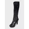 High-heeled leather boots
