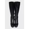 High-heeled leather boots