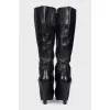 High-heeled leather boots