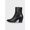 Black leather Cossack boots with a stacked heel